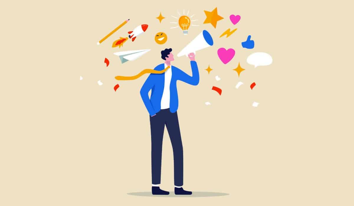 An illustration depiction of a person in a blue and gray suit stands with a megaphone in their right hand. Out of the megaphone emerges various symbols such as hearts, stars, pencils, and thought bubbles.